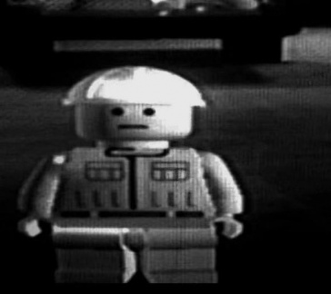lego chokbar choque fond noir et blanc