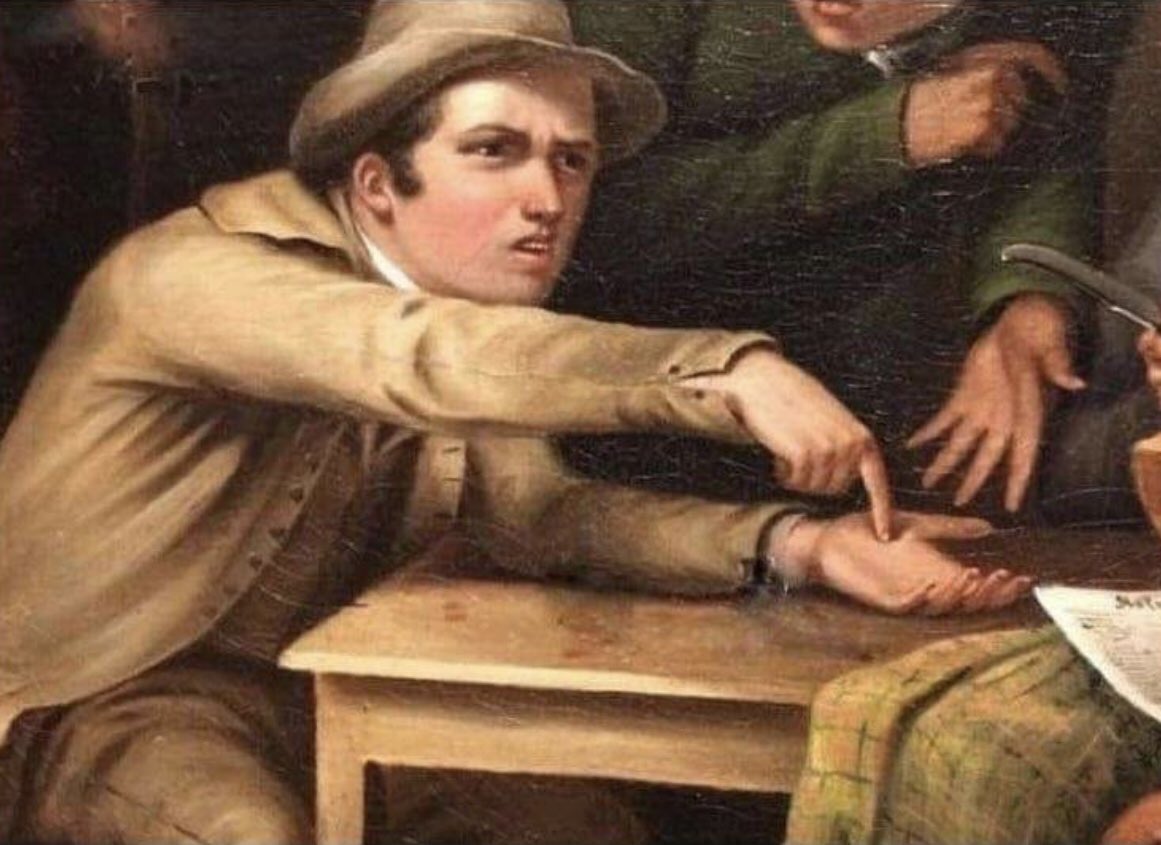 Angry man pointing at hand