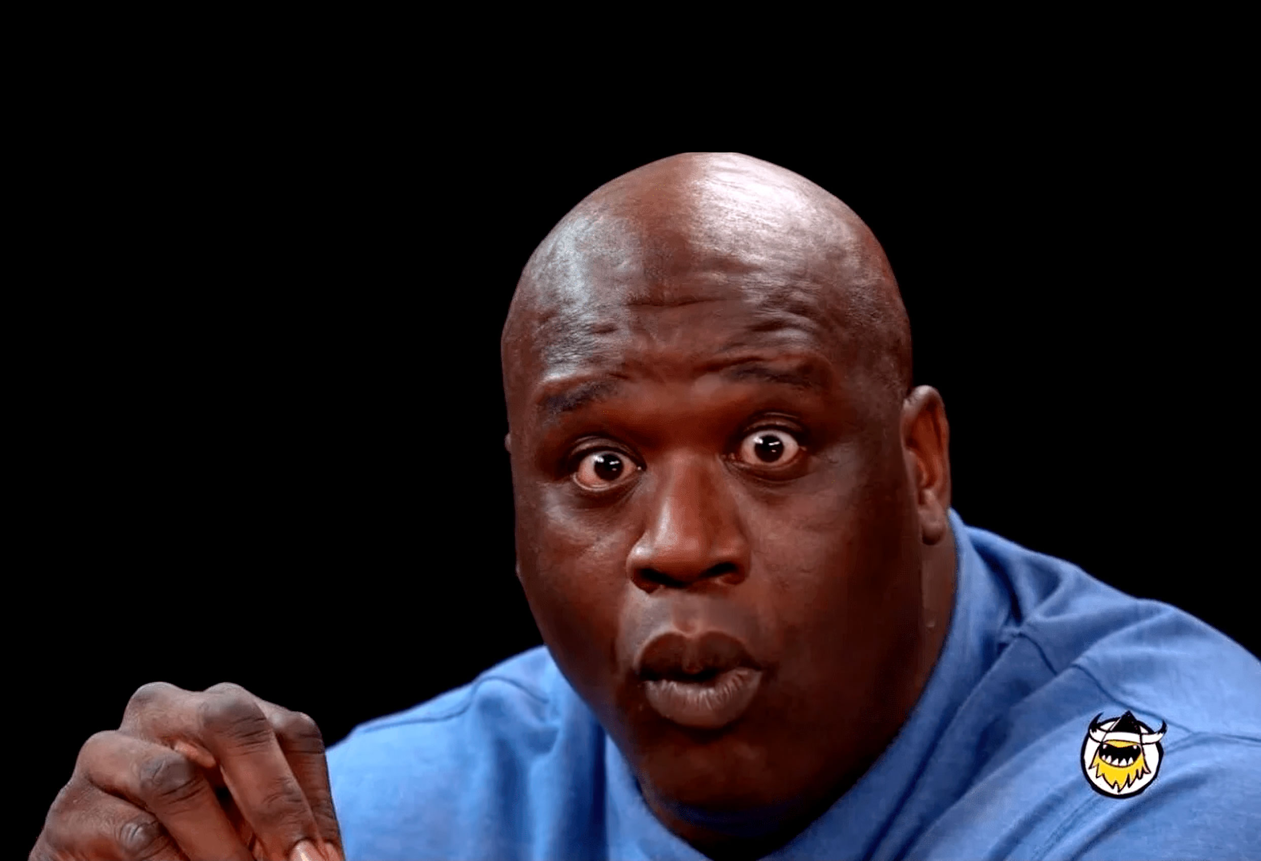 Shaq tries to not make a face