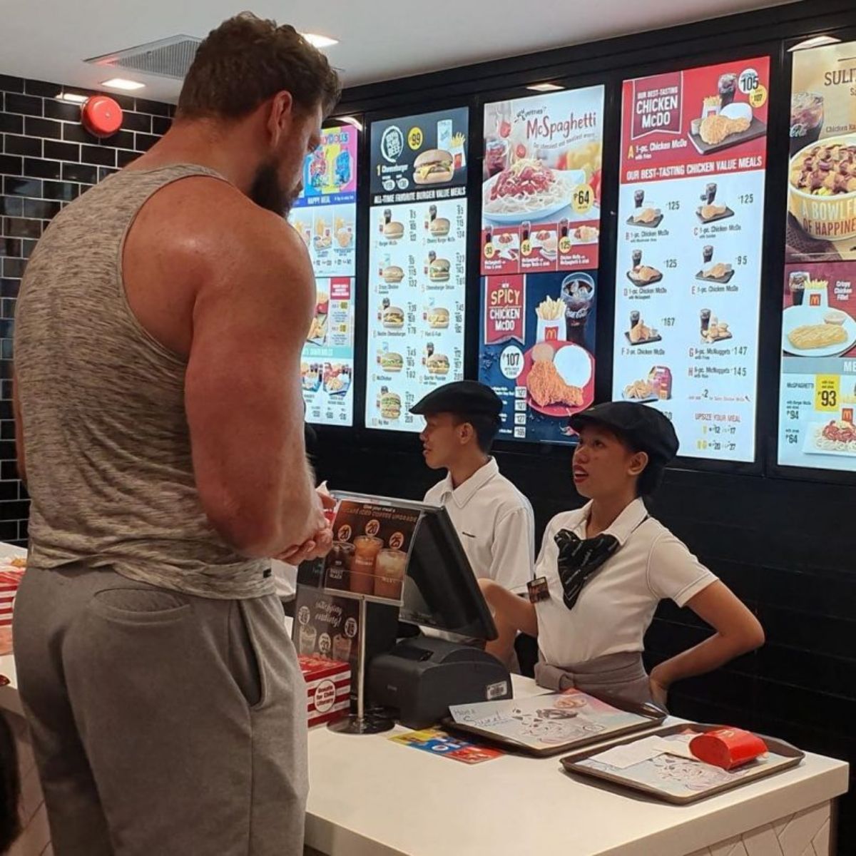 Huge man ordering food