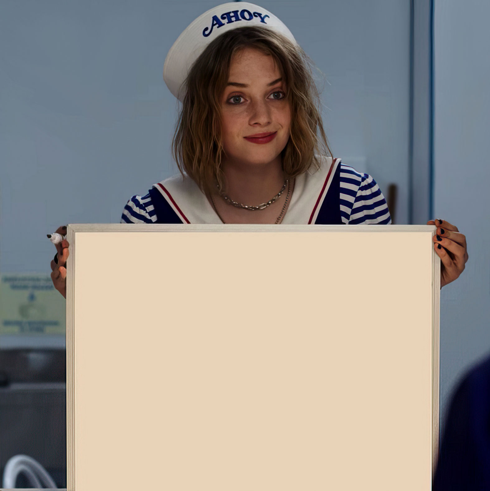 Robin holding a whiteboard