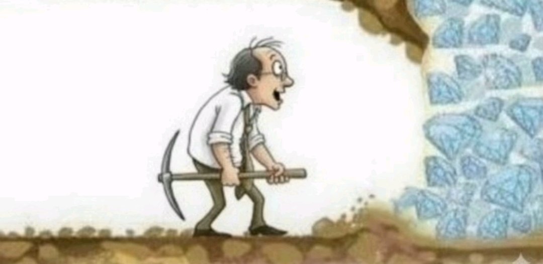 Homme avec pioche atteignant un mur de diamants