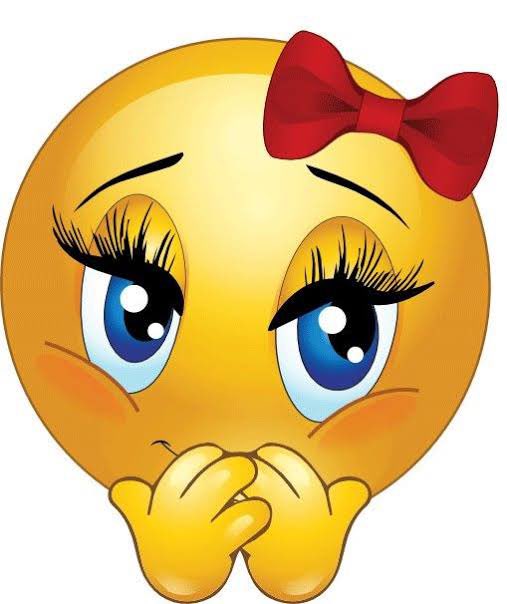 Emoji timide avec noeud rouge