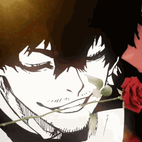 Oliver Aiku avec une rose entre les dents
