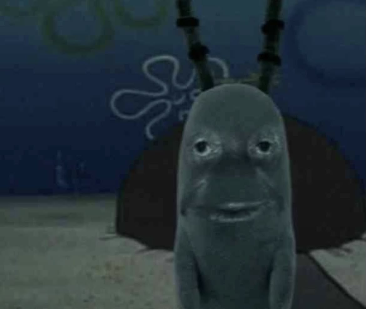 Plankton regarde fixement avec un visage humain réaliste, choqué, fatigué