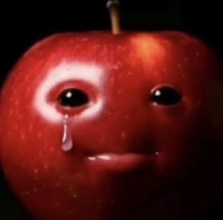 Pomme rouge avec un visage qui pleure