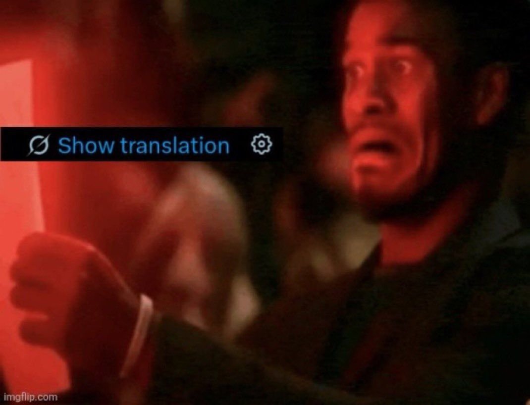 Jimmy Butler effrayé en lisant une feuille avec le bouton Show translation