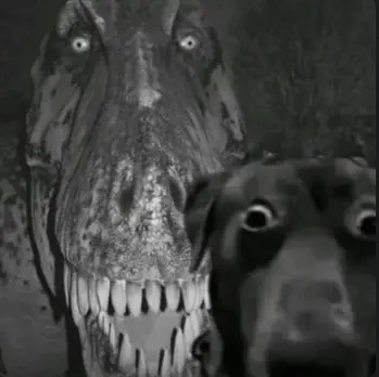 T-Rex effrayant derrière un chien apeuré