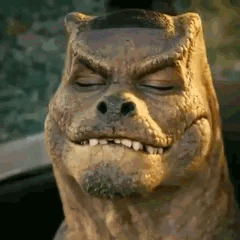 Reptile qui hoche la tête en souriant