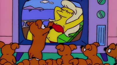 La famille Simpson et Les chiots des Simpson regardent la télé et poussent le chat lorsqu'il essaie de s'intégrer au groupe