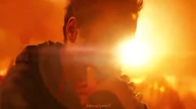 Tony Stark blessé et Thanos qui tombe en poussière